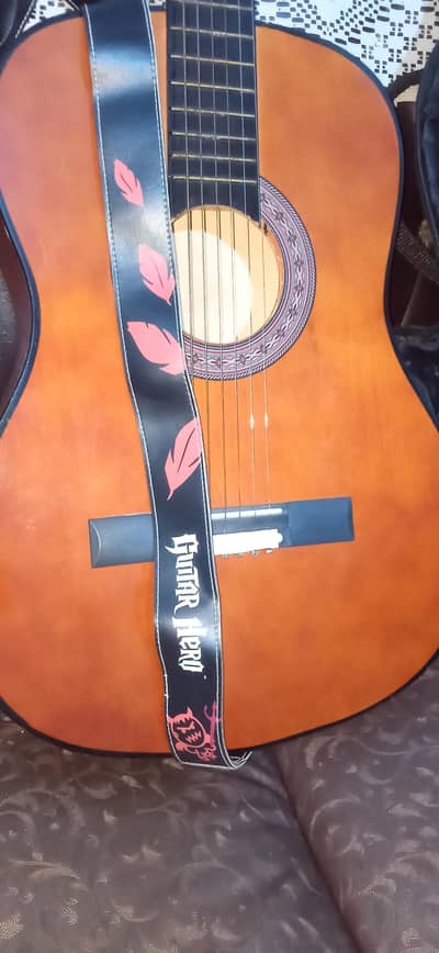 Acustic Guitar + Guitar bag + Guitar stirrings pak + 3 imported pics
