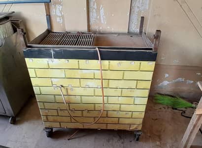 Hot plate with grilled convertable into a food stall