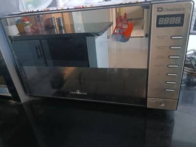 dawlance digital microwave  bohoot km use kia hai, buy kia hi 1 year.