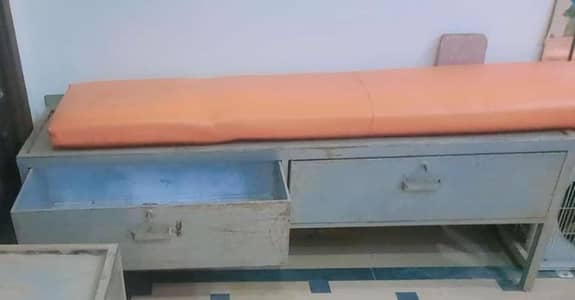 iron bench with spacious drawers and cusion seat