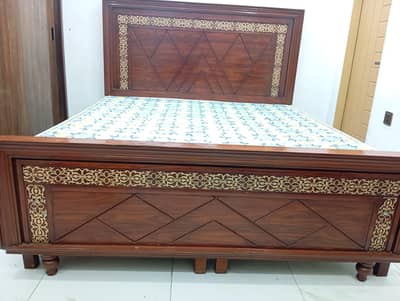 king size bed and side tables and dressing table