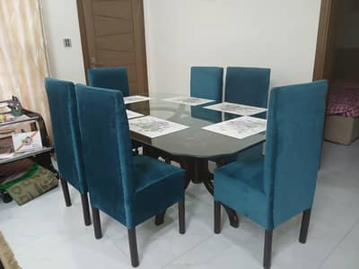 wooden dining with glass top