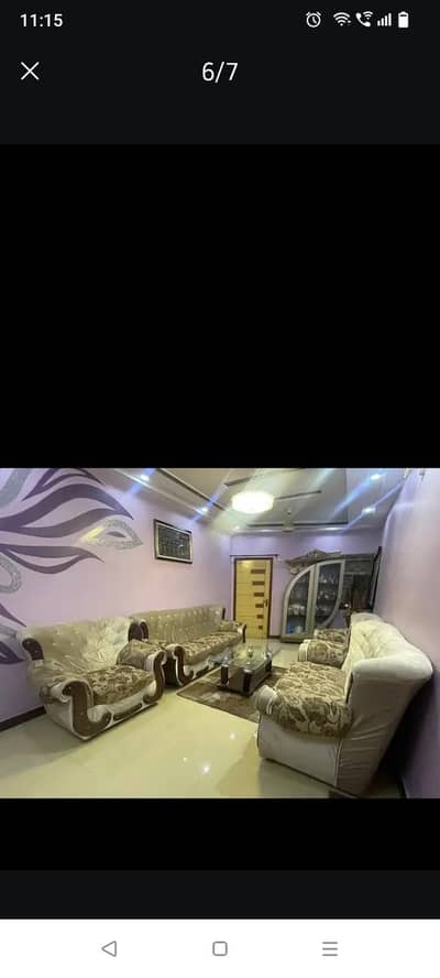 Sofa , carpet and book shelves