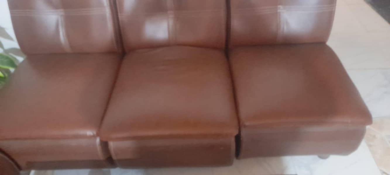 5 seaters rexine sofa with table 1