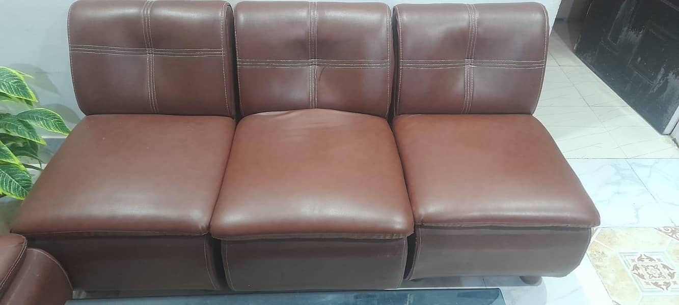 5 seaters rexine sofa with table 3
