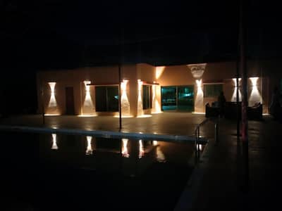 Palm Village Farm House