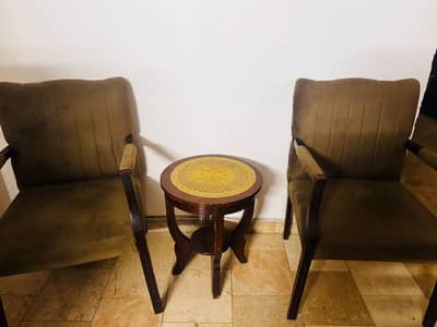 Two chairs with table