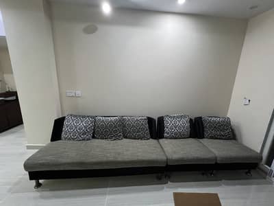 lavish and modern grey and black sofa set