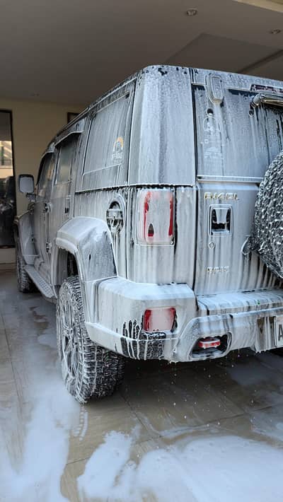 Car washer for service station