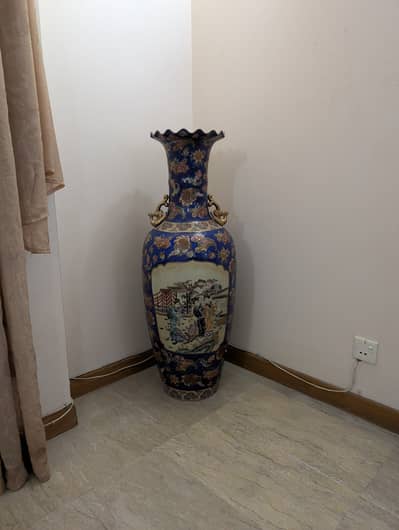3 porcelain 5ft vases and 2 ceramic 2ft vases