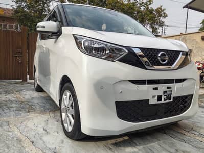 Nissan Days white colr brand new condition model 23/26