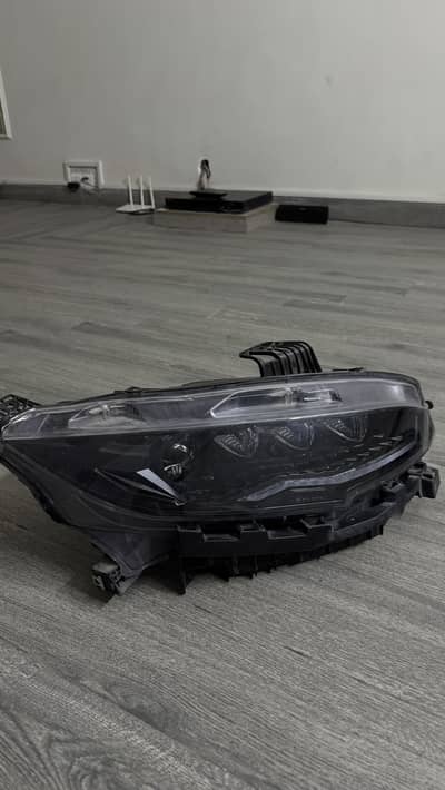 civic x front right(driver) side transformer style light