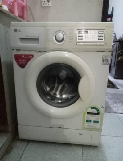 FULLY AUTOMATIC FRONT LOAD WASHING MACHINE