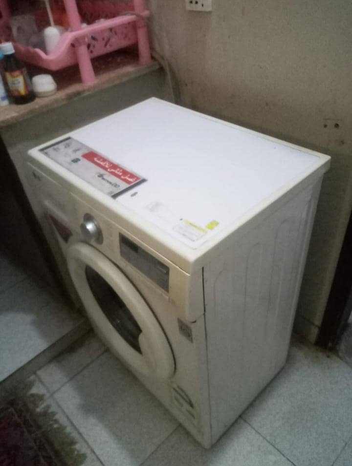 FULLY AUTOMATIC FRONT LOAD WASHING MACHINE 3