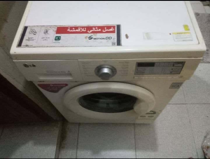 FULLY AUTOMATIC FRONT LOAD WASHING MACHINE 4