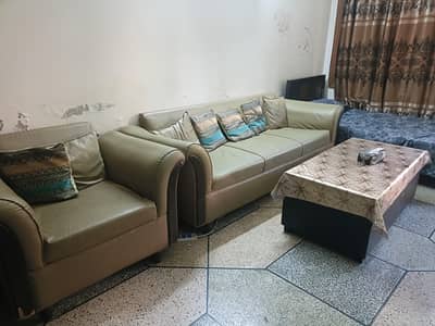 5 seater sofa set with central table and cushions