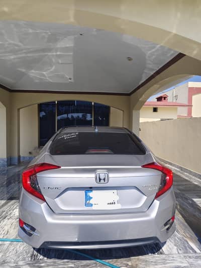 Honda civic silver color 10 out of 10 condition.