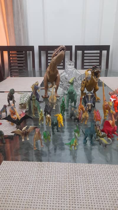 A set of dinosaurs toys for sale