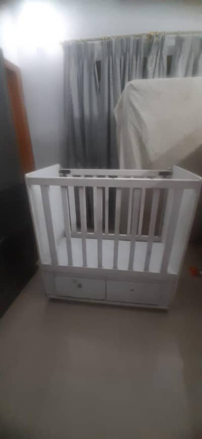 baby cot white finish with 2 full sized adult cushions