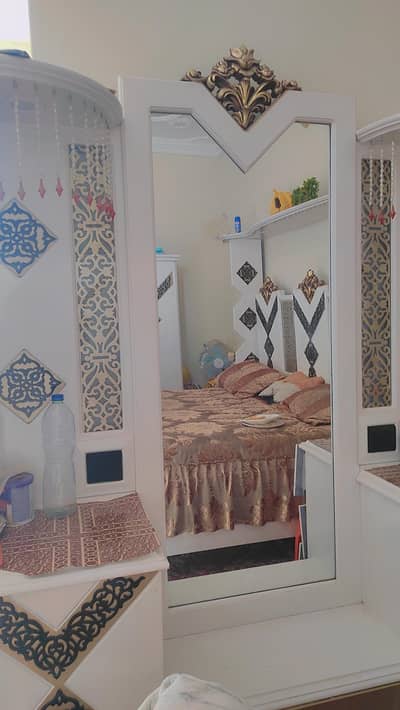 bed and dressing table