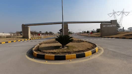 A Spacious 5 Marla Residential Plot In UpCountry Enclosures Housing Society