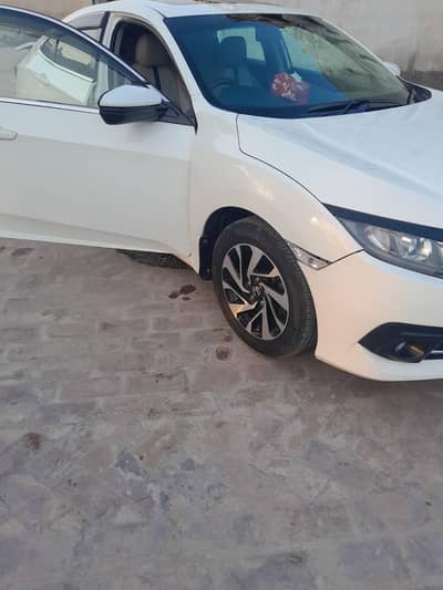 Honda civic oriel prismatic UG full option. only one door touched.