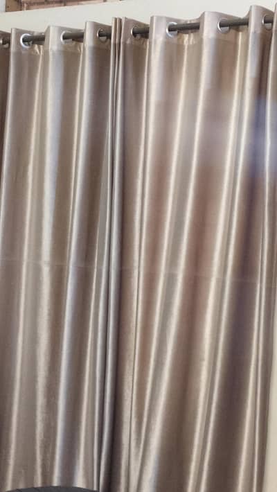 golden brown pair of curtains for sale