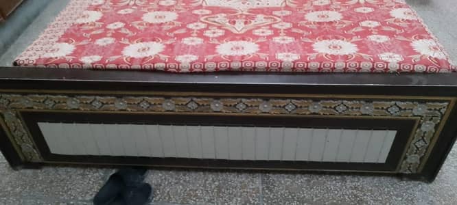 Double bed with spring mattress for sale