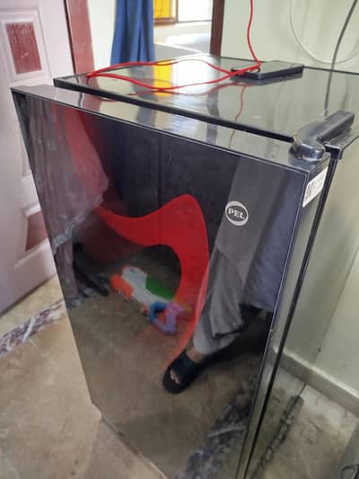 Pel Glass Door Red Blaze Room Fridge almost unused in low price