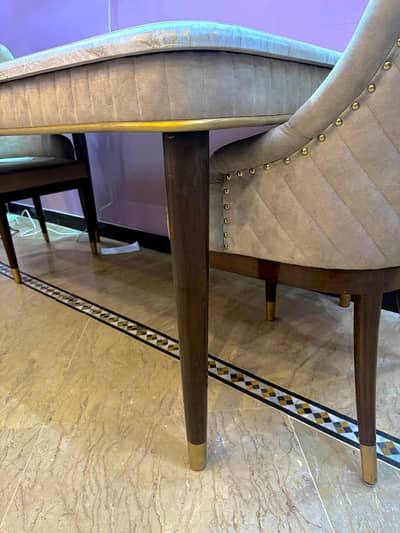 dining table with six chairs. ”