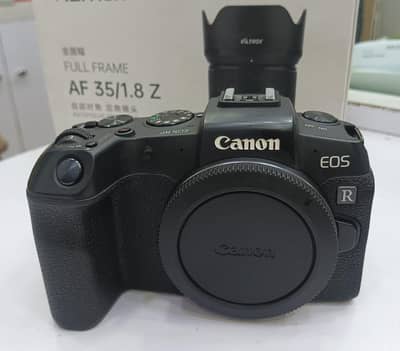 cannon RP mirror less DSLR camera with original charger