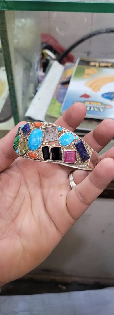 silver bracelet with 20 real stones