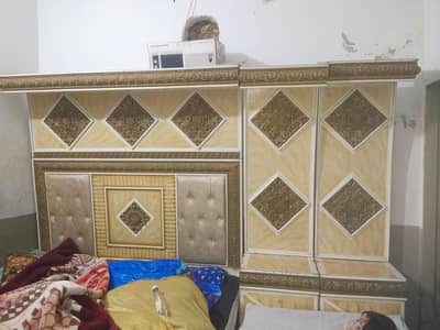 King bed with Side Tables and Wardrobes and Dressing Table and Sofa