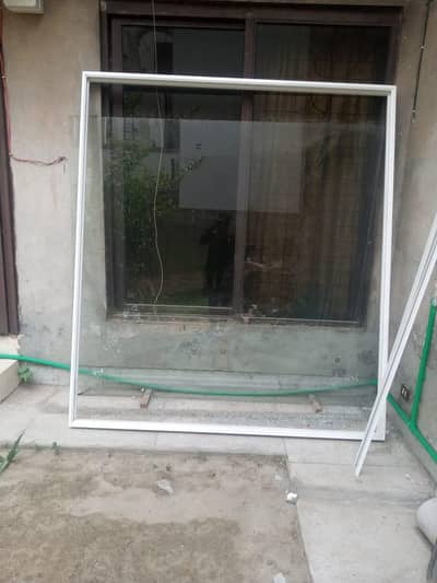 Tempered glass window with pvc frame. 7 by 8. DHA