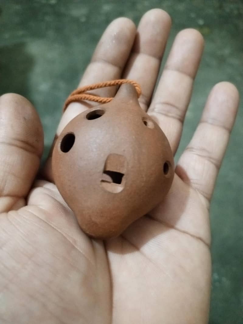 Tiny clay wind instrument 2