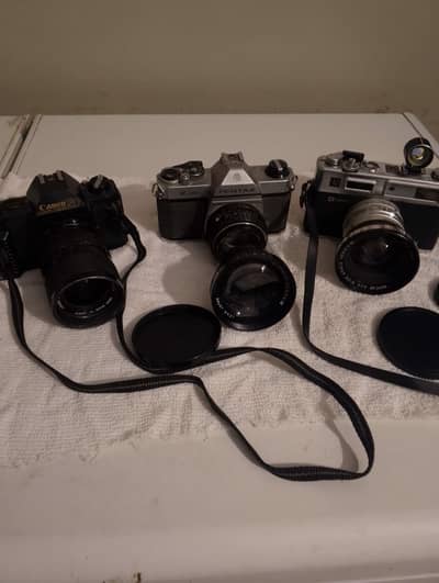 3 camera 2 lens Yashika, canon pentex