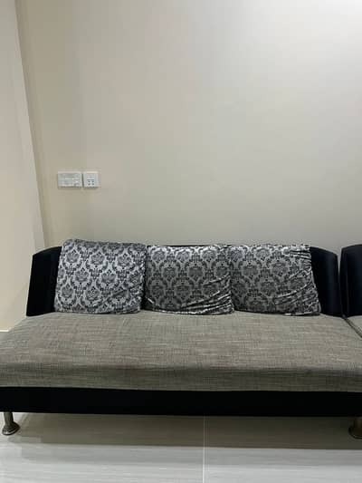 lavish and modern grey and black sofa set