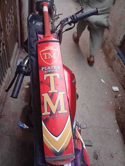 TM edition tape ball coconut wood bat