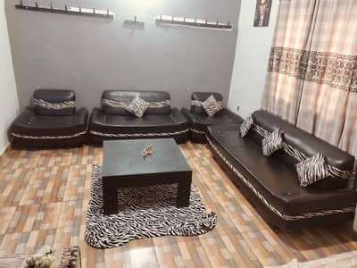 selling urgent - 7 seater Sofa set with Table