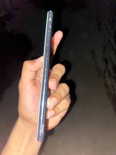 one hand use phone  ""I Am  playing pupg on it""