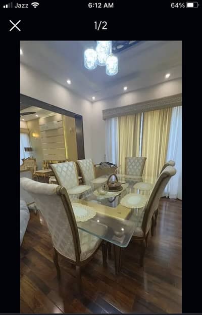 A mirror Dining Table with 6 chairs