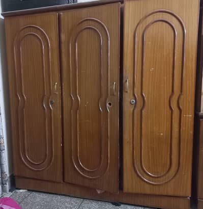 3 door heavy wooden cupboad
