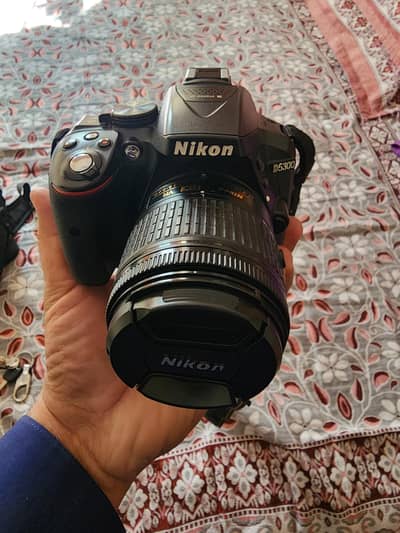 Nikon D5300 10/10 condition  shutters count 6000 to 10000 roundabout