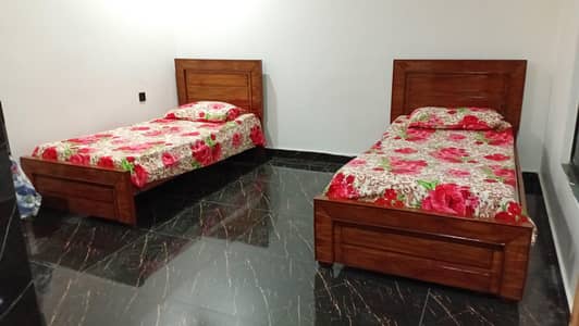 New (2 single bed wooden solid bed )with glass polish without maters