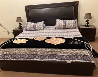 King size bed with side tables and dressing table