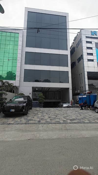 1 KANAL BRAND NEW SEVEN STOREY BUILDING ON MAIN ROAD FOR RENT