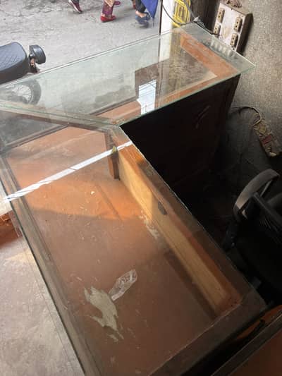 2 wooden with glass counter used to mobile shop