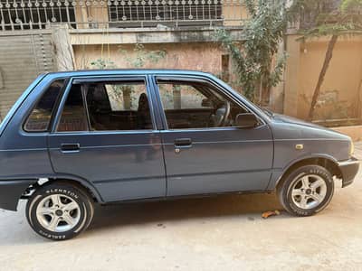 Suzuki mehran 2013  (2 piece touching)
