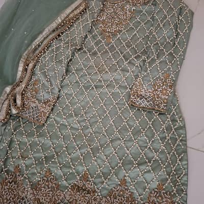 net suit hai shirt sharara dupaata used hai 1/2 Baar