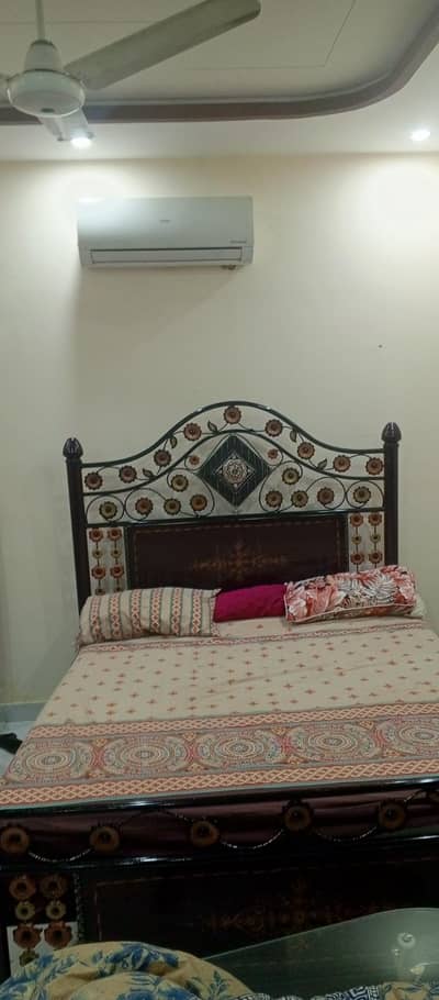 bed with mattress and side tables